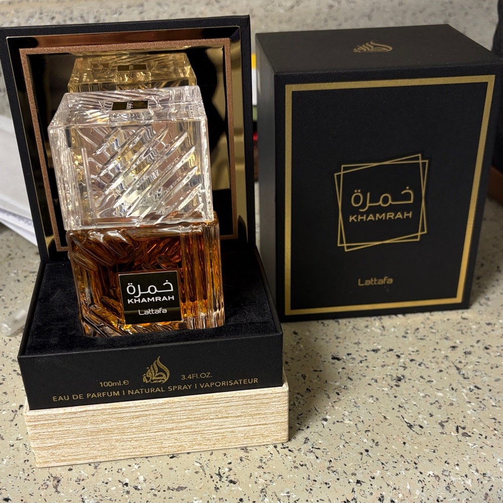 Lattafa Khamrah Perfume - Elegant Gold and Black Design